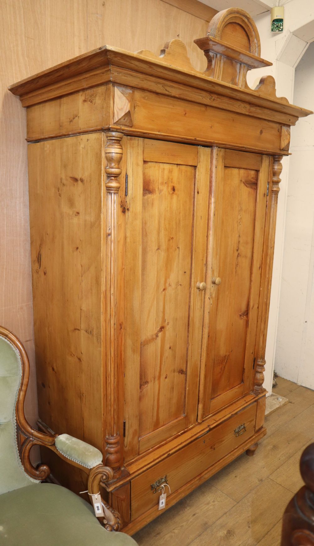 A small 19th century Continental pine armoire, W.120cm D.68cm H.214cm